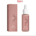 Pink glass bottle with white dropper cap and matching box of milano drop skin toner watermelon tanning face serum with skin repair drops