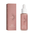 A sleek 50ml glass bottle of watermelon tanning face serum with skin repair drops and rose gold packaging