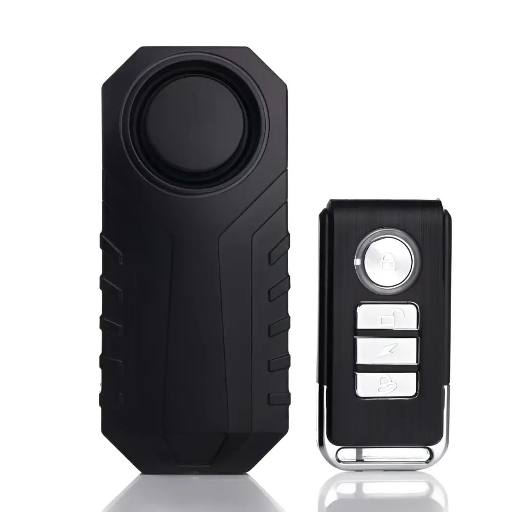 Black plastic waterproof bike alarm remote control anti theft system with rugged textured body and three silver buttons
