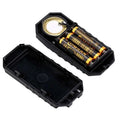 Black plastic waterproof bike alarm remote with textured grip and removable battery compartment housing three omsan batteries