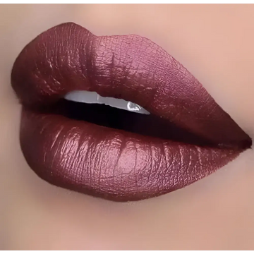 A rich metallic burgundy shimmer waterproof metal lipstick with a glossy finish and long-wearing non-fading formula