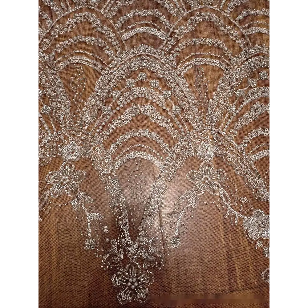 Silver sequined lace fabric with intricate silver floral and wave style sequin bead lace for wedding dress design