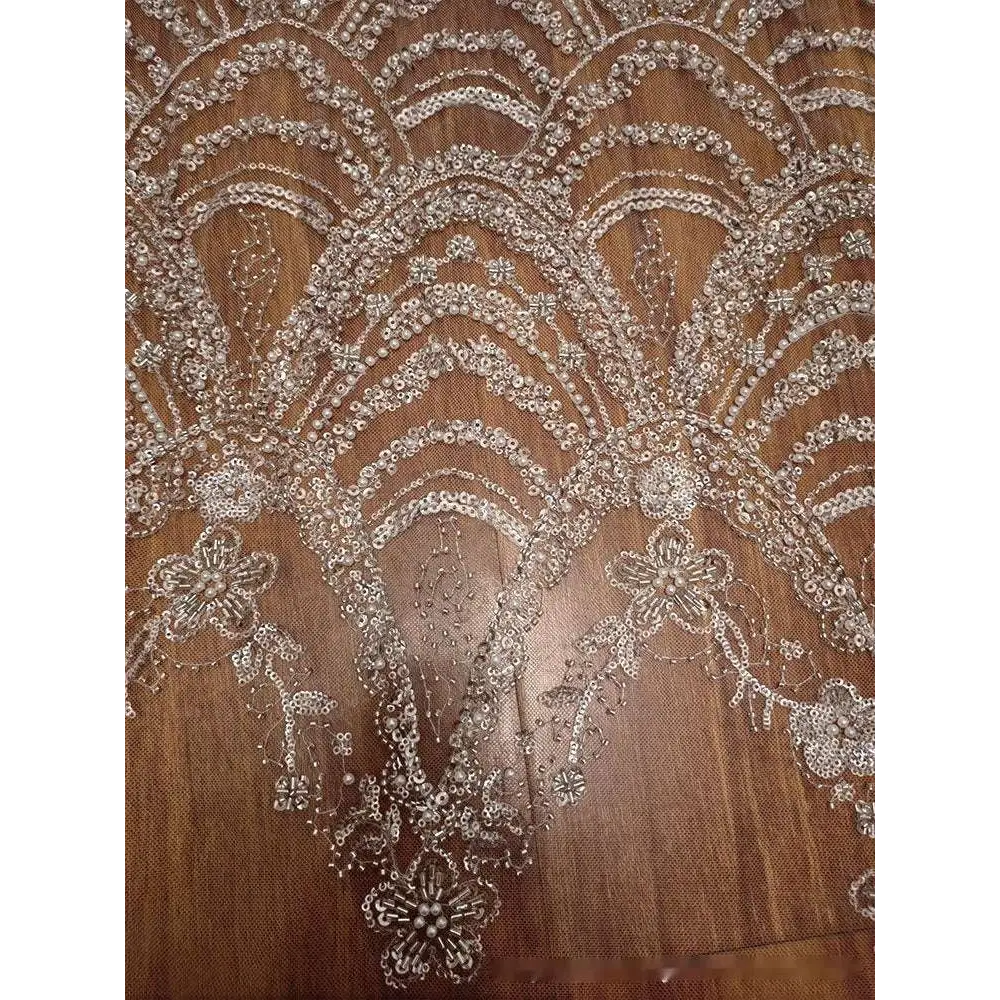 Silver beaded lace fabric with intricate silver floral wave style sequin bead lace patterns for wedding dress