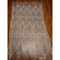 Wave style sequin bead lace fabric featuring intricate silver beaded scalloped patterns for wedding dress design