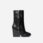 Black leather ankle boot with leather wedge heel and zipper closure designed in large size boots style