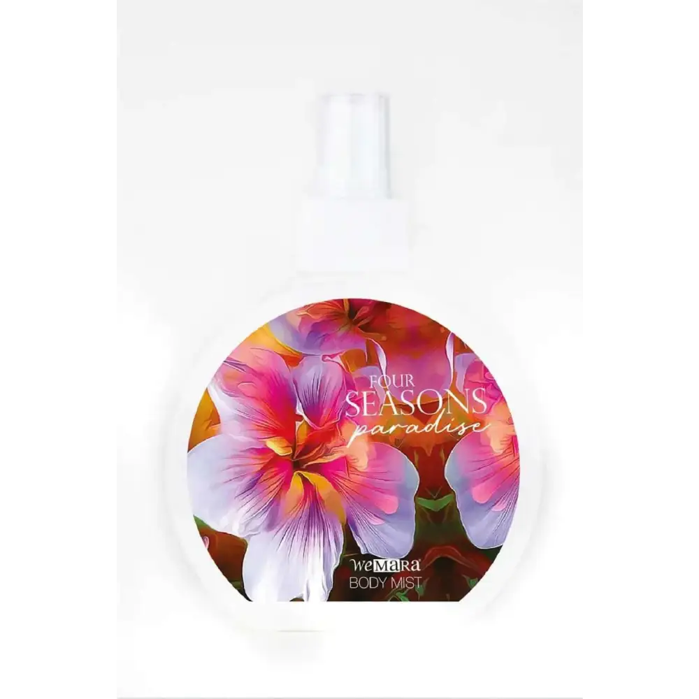 A white circular bottle of Wemara Guardian Angel body mist with vibrant pink purple and orange floral design
