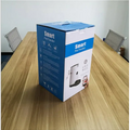 White and black pet automatic feeder with water bottle shown in blue and white box featuring battery power supply and feeding remote