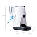 White and gray pet automatic feeder with battery power supply and feeding remote features clear water dispenser side