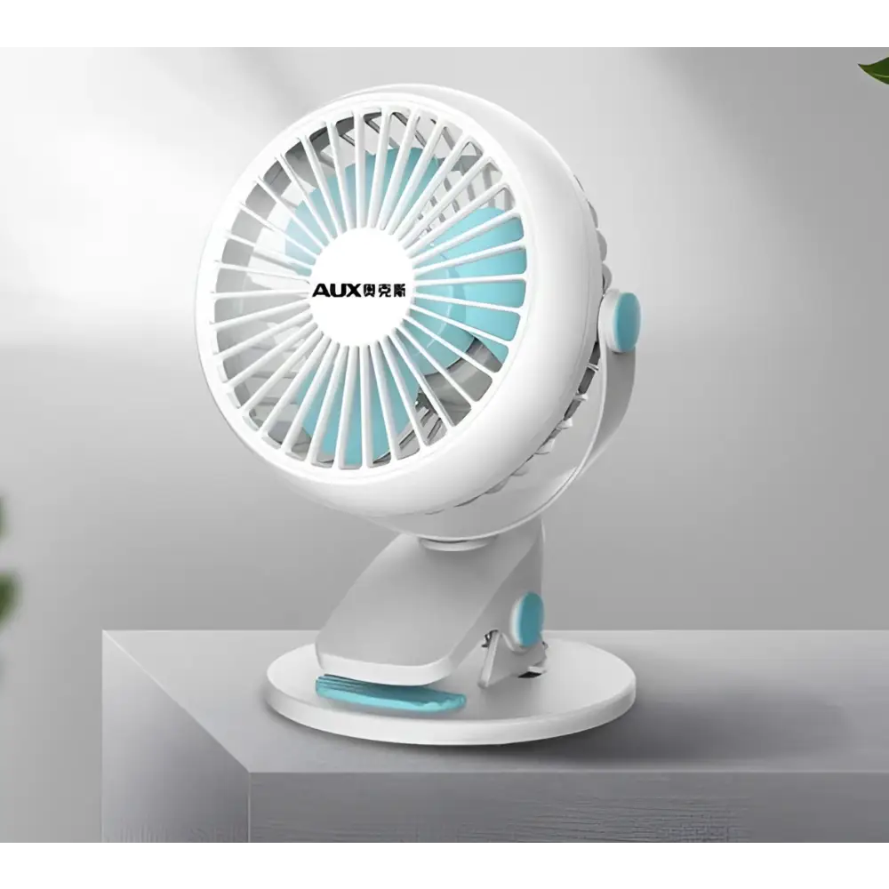 White and blue aux brand misting fan with circular design and blue clip portable mini desktop fan with clip-on base