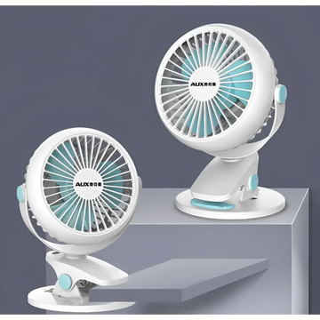White and blue clip on portable mini desktop fan with circular design and blue clip for misting fan use