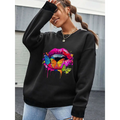 Black crew neck sweatshirt with white butterfly lips graphic featuring colorful lips, butterflies, and paint drips