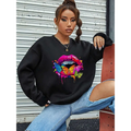 Black oversized crew neck sweatshirt featuring a vibrant white butterfly lips graphic with colorful butterflies and dripping paint effects
