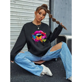Black oversized crew neck sweatshirt featuring a vibrant white butterfly lips graphic with dripping paint design