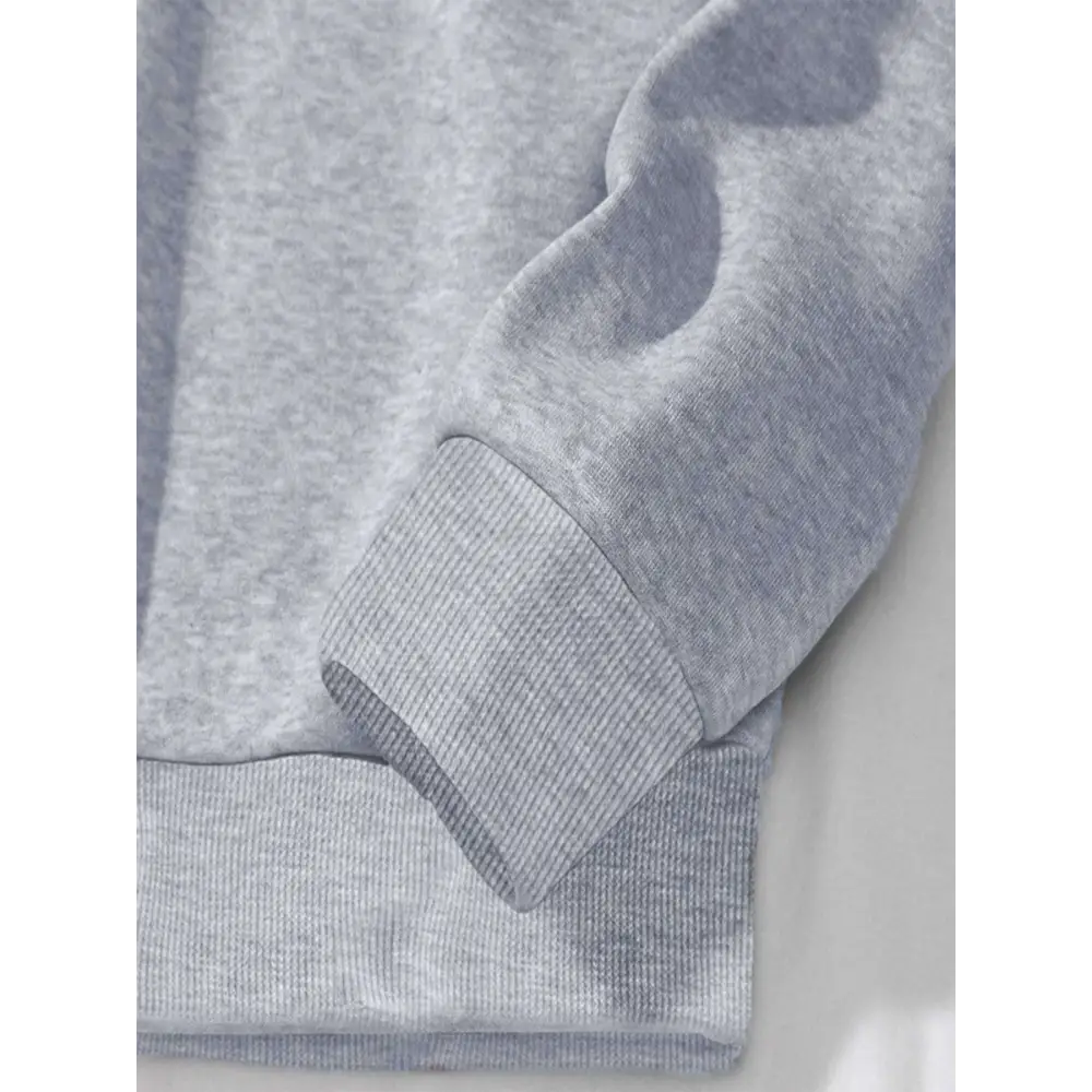 Gray heathered sweatshirt sleeve with ribbed cuffs on white butterfly lips graphic crew neck sweatshirt