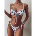 White butterfly print lace thong bikini with ruffled tied straps and blue butterfly prints in a butterfly print swimsuit