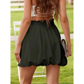 Black ruffled mini skirt featuring an elastic waistband with gathered waistband detail for casual graceful wear
