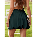 Dark green flowy ruffled mini skirt with elastic gathered waistband perfect for casual graceful wear