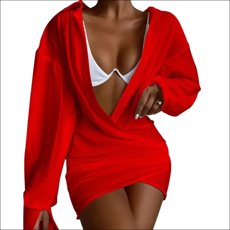 Vibrant red solid color long sleeve mini dress with a plunging neckline and asymmetrical hemline in wrap style