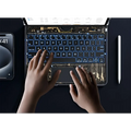 White core transparent rotating keyboard with glowing blue backlight gold circuit board and pen slot for ipad use