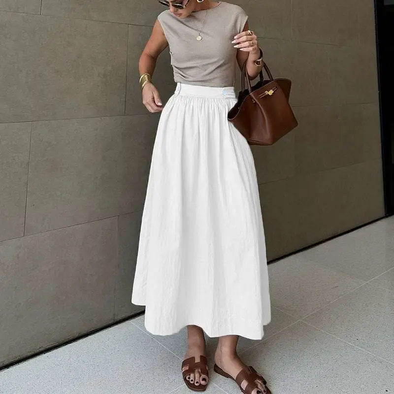 White cotton linen slimming large hem midi skirt with high waist and subtle pleats for a soft flowing look