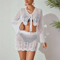 White crochet knitted beach bikini two-piece set featuring bell sleeves and scalloped hem for beachwear