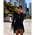 Black knitted long-sleeved dress with v-neck and side slit as a crochet women swimsuit cover-up dress