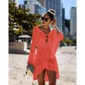 A vibrant coral long-sleeved crochet women swimsuit cover-up dress with v-neck and eyelet pattern for beachwear