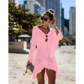 Pink long-sleeved crochet women swimsuit cover-up dress with v-neck and open side cutouts