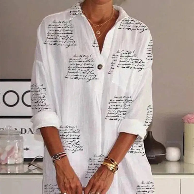 White cotton slim shirt dress featuring black cursive letter printed design and rolled-up sleeves