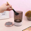 White cylindrical makeup brush cleaner and holder in brown translucent abs pc tpe with rose gold lid and 7000rpm spin speed