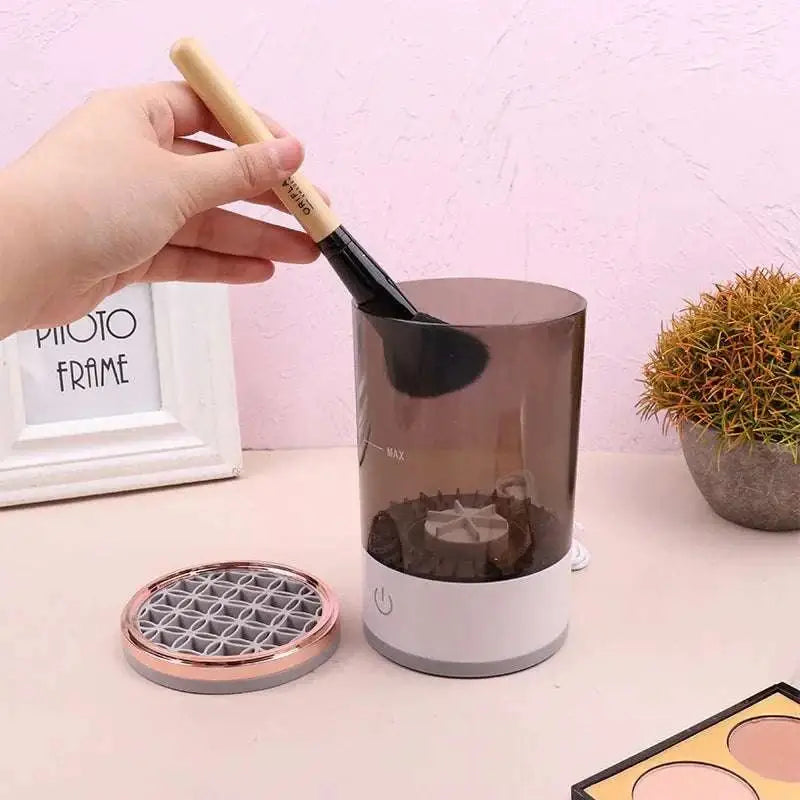 White cylindrical makeup brush cleaner and holder in brown translucent abs pc tpe with rose gold lid and 7000rpm spin speed