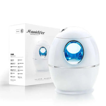 White egg aromatherapy humidifier usb rechargeable with glowing blue display and silver accent band for usb rechargeable home use
