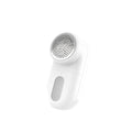 White electric lint and bulb remover with circular perforated head and smooth plastic body for luxury women’s fashion care