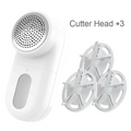 White handheld electric lint and bulb remover with three interchangeable cutter heads for luxury women’s fashion care