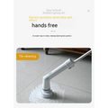 White electric scrubber cleaning wall brush with ergonomic handle and rotating brush head for hands-free tile cleaning