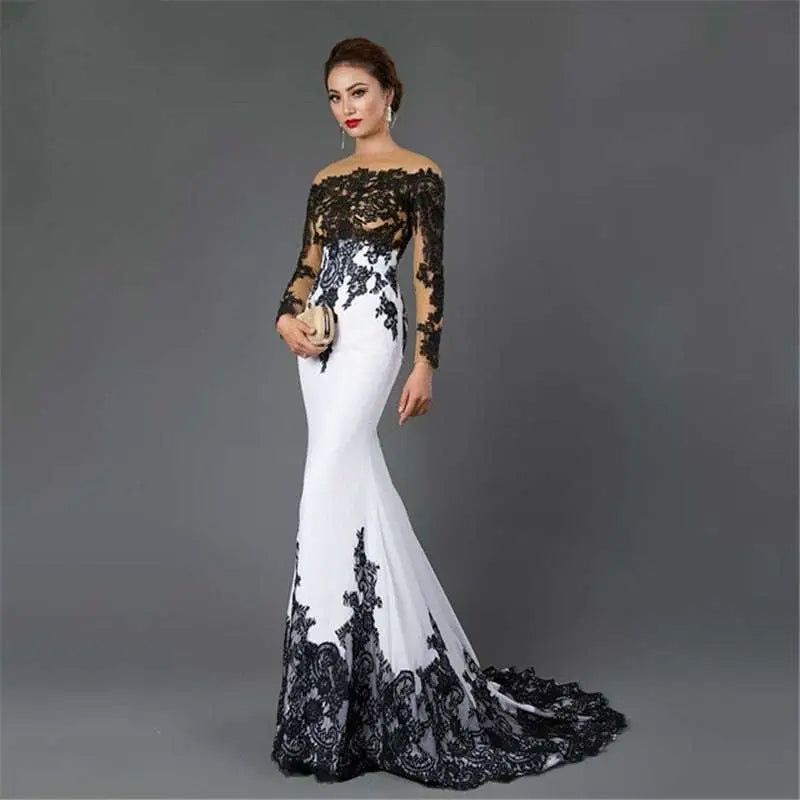 Elegant white embroidered lace maxi fishtail slim tail gown with intricate black lace detailing on bodice sleeves and hemline