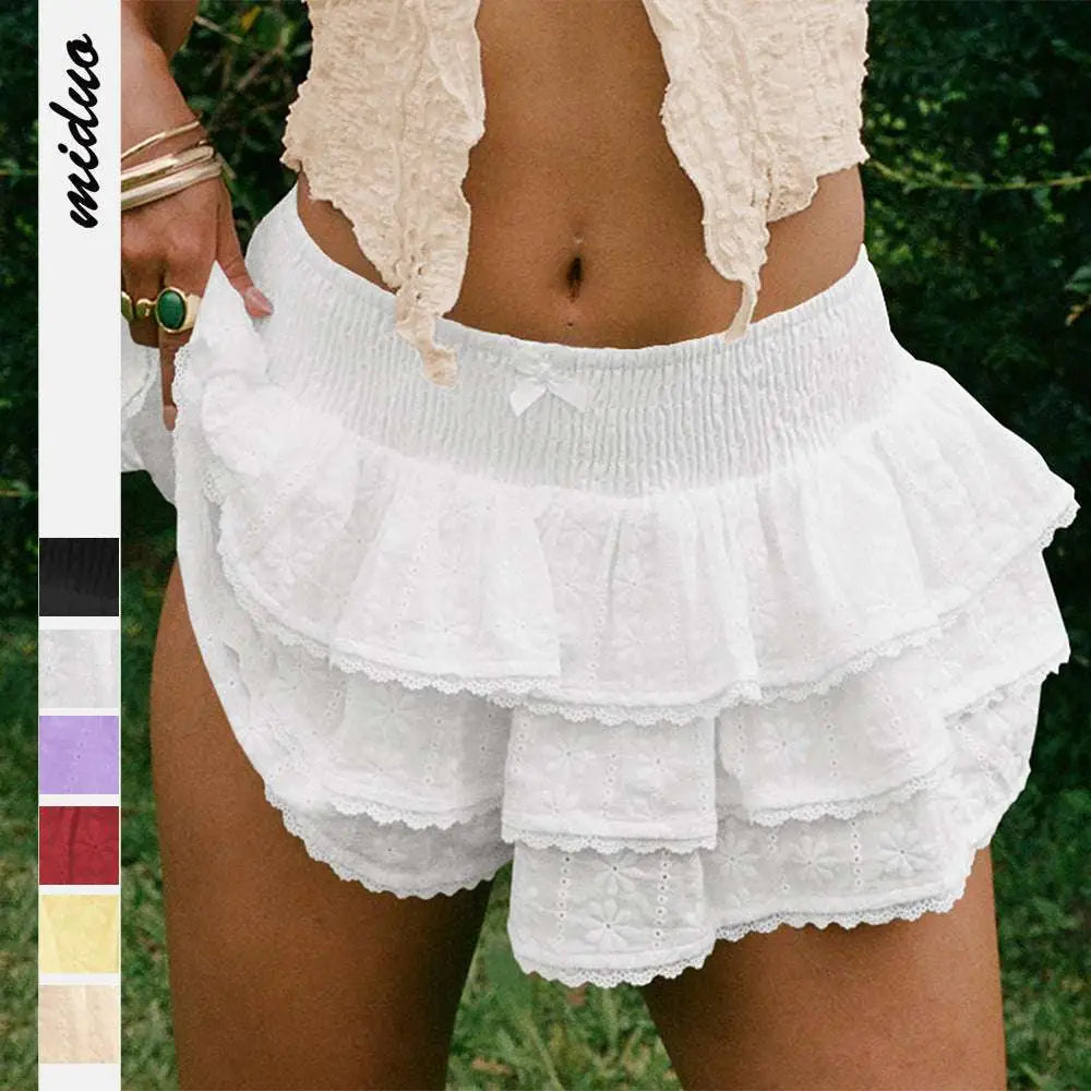 White eyelet lace bow decorative bud skirt with layered ruffle shorts and smocked waistband with bow detail