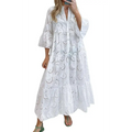 White eyelet maxi boho lace dress with tiered ruffles and v-neckline in lightweight fabric