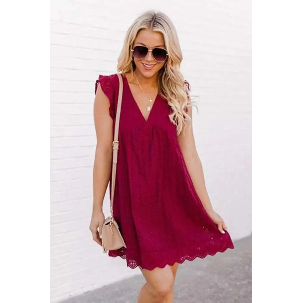 White eyelet pocket summer sleeveless dress with v-neckline flutter sleeves in breathable jacquard fabric