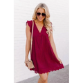Deep red lace sleeveless dress with v-neckline and scalloped hem contrasting the white eyelet pocket summer sleeveless dress design