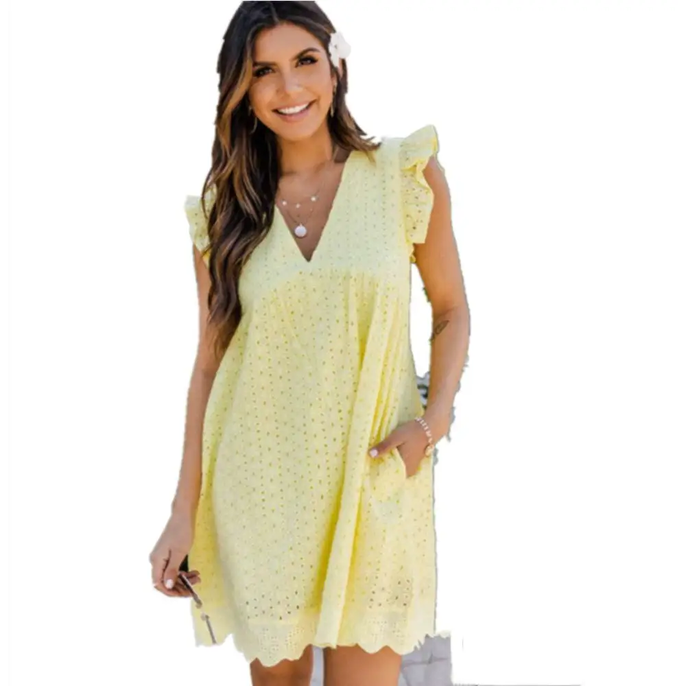 A light yellow summer sleeveless dress with eyelet lace, ruffled cap sleeves, and scalloped hem detail