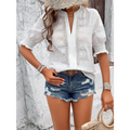 White eyelet blouse with puff sleeve design hollow hair ball detail and v-neckline for elegant wear