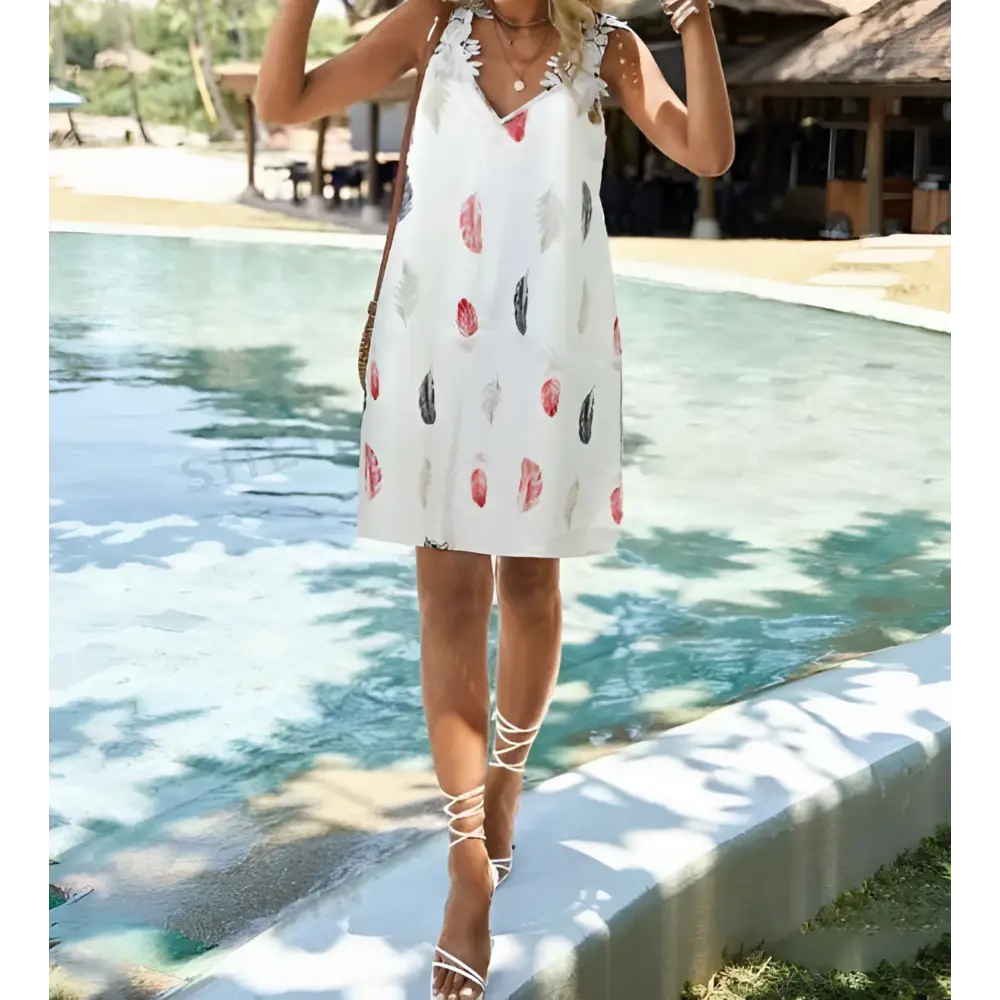 White feather printed fashion sleeveless lace dress with v-neckline and delicate lace trim on white fabric