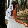 White featherhead bohemia wedding bridal hair band featuring delicate natural feather adornments in white color