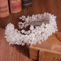 Delicate white floral crystal headband with intricate beaded branches and silver-toned base for headband styling accessories