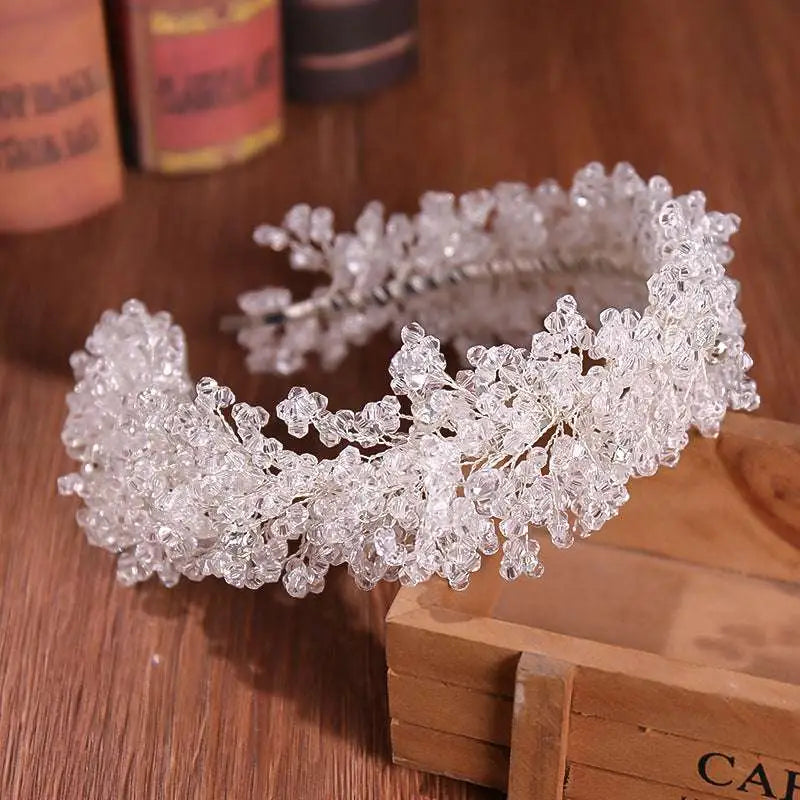 Delicate white floral crystal headband with intricate beaded branches and silver-toned base for headband styling accessories