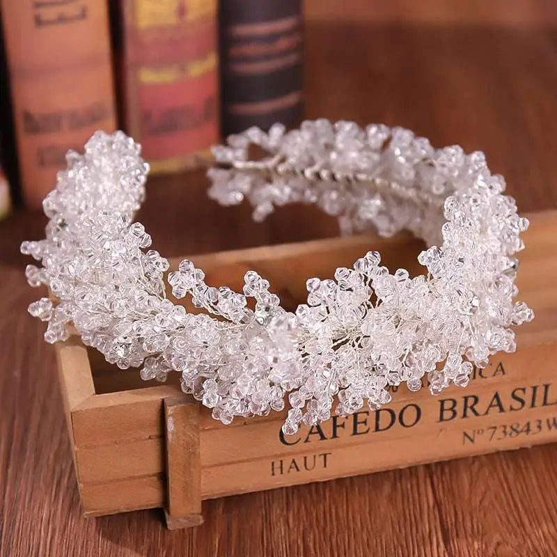 Delicate white floral crystal headband with intricate beaded lace design as elegant headband styling accessories