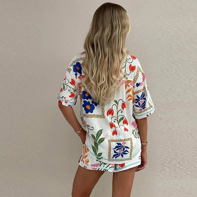 White floral slim fit short sleeve shirt set featuring colorful embroidered flowers and decorative borders on fabric