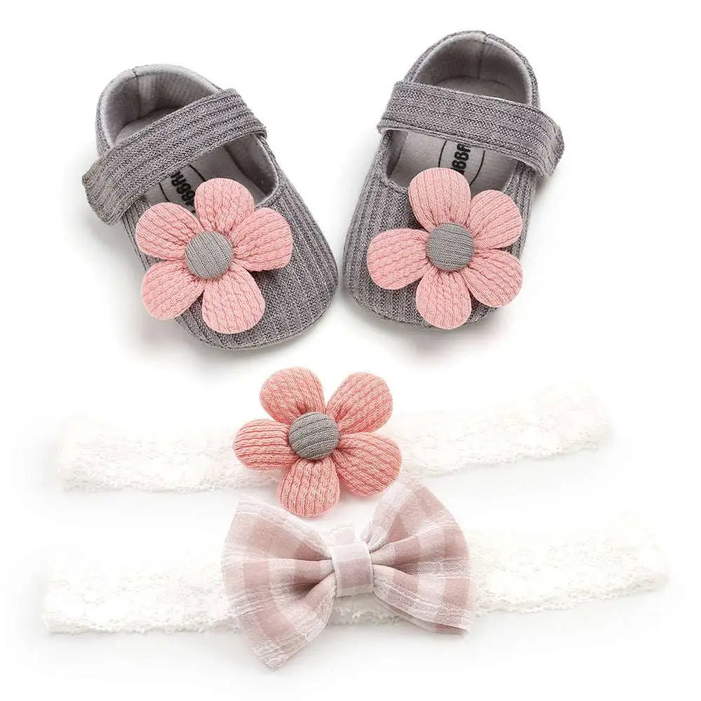 Gray knit baby shoes with pink fabric flowers and matching lace headband with plaid bow white flower princess