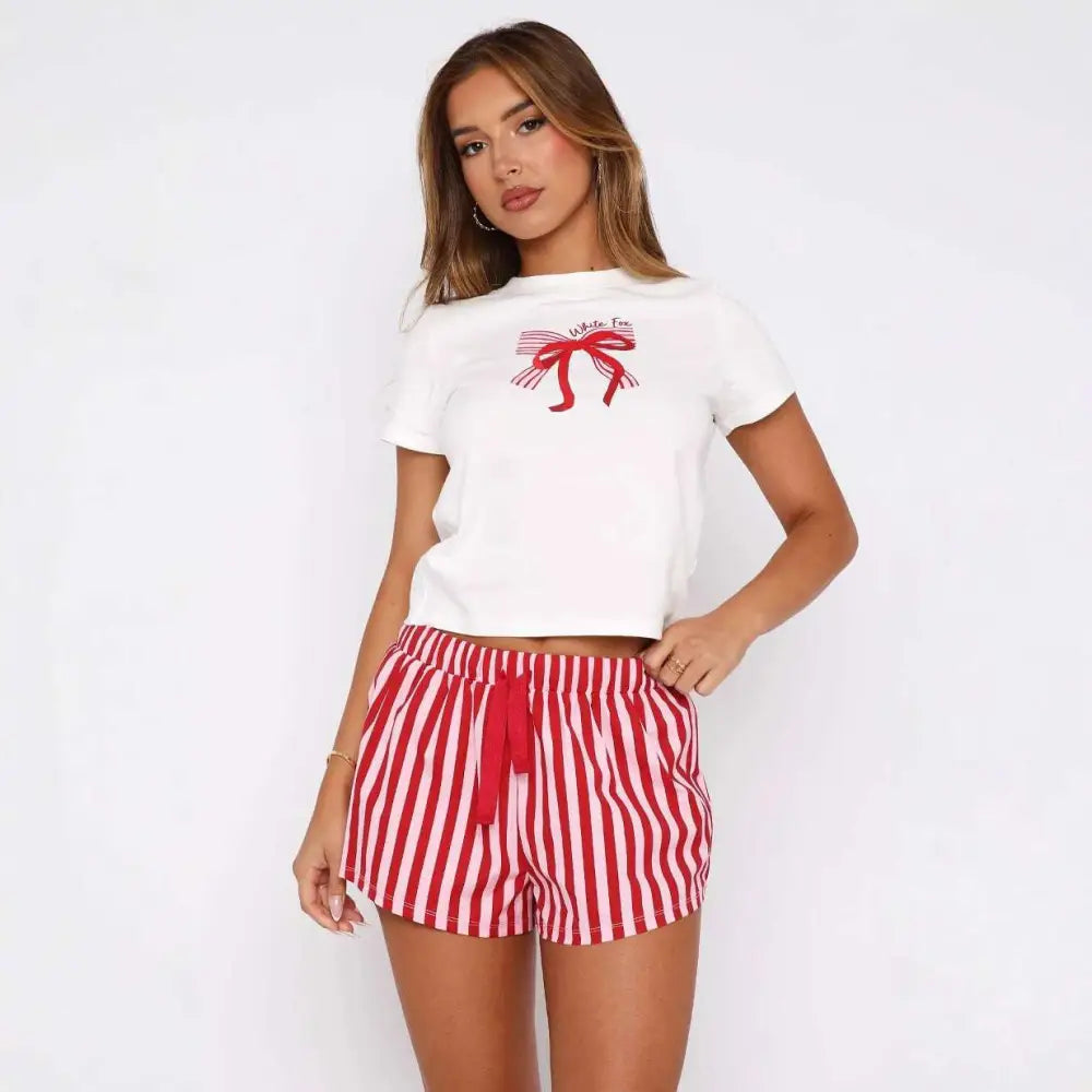 White cropped t-shirt with red bow graphic and white fox text in sweetheart pajamas printing suit with white fox shorts
